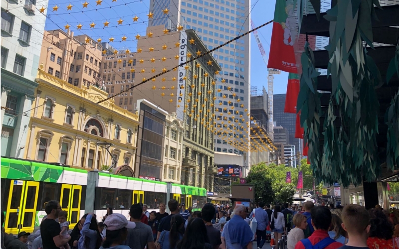The streets are full during the festive season on Swanston Street.